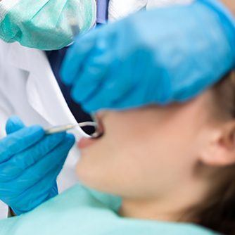 Patient receiving dental treatment