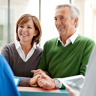 Older man and woman during consultation