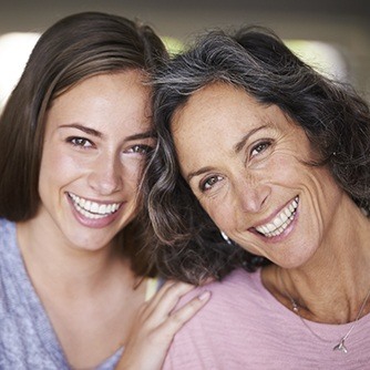 Laughing mother and daughter