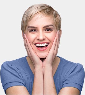Smiling woman with hands on her cheeks