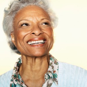 Senior woman with a beautiful smile thanks to the implant dentist Farmington residents rely on