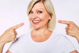 Woman with dental implants in Farmington