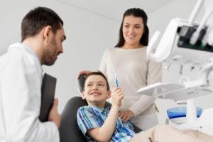 Mom and child at dentist in Farmington