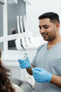 Dentist discussing Invisalign with patient