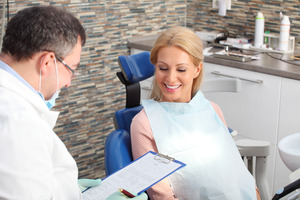 dentist talking to a patient